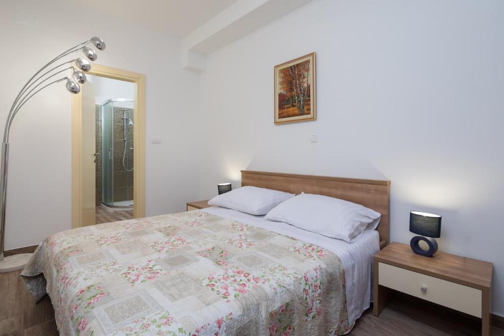 Postel nebo postele na pokoji v ubytování The Beach Suites