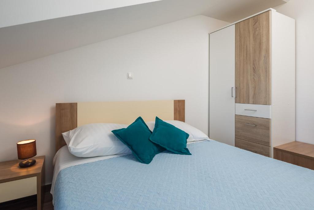 Postel nebo postele na pokoji v ubytování The Beach Suites