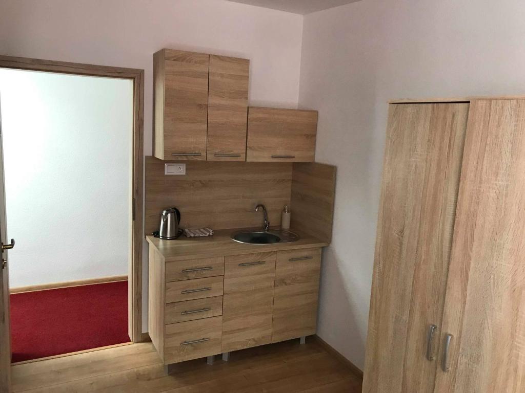Kuchyň nebo kuchyňský kout v ubytování Ubytovanie MI - TATRY