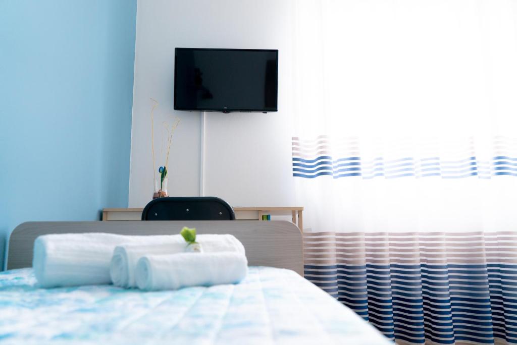 Telewizja i/lub zestaw kina domowego w obiekcie B&B Alle Falde Dell'Etna