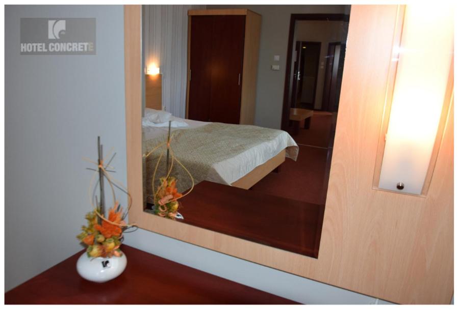 Postel nebo postele na pokoji v ubytování Hotel Concrete