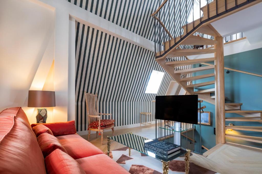 TV a/nebo společenská místnost v ubytování Hôtel Longemalle