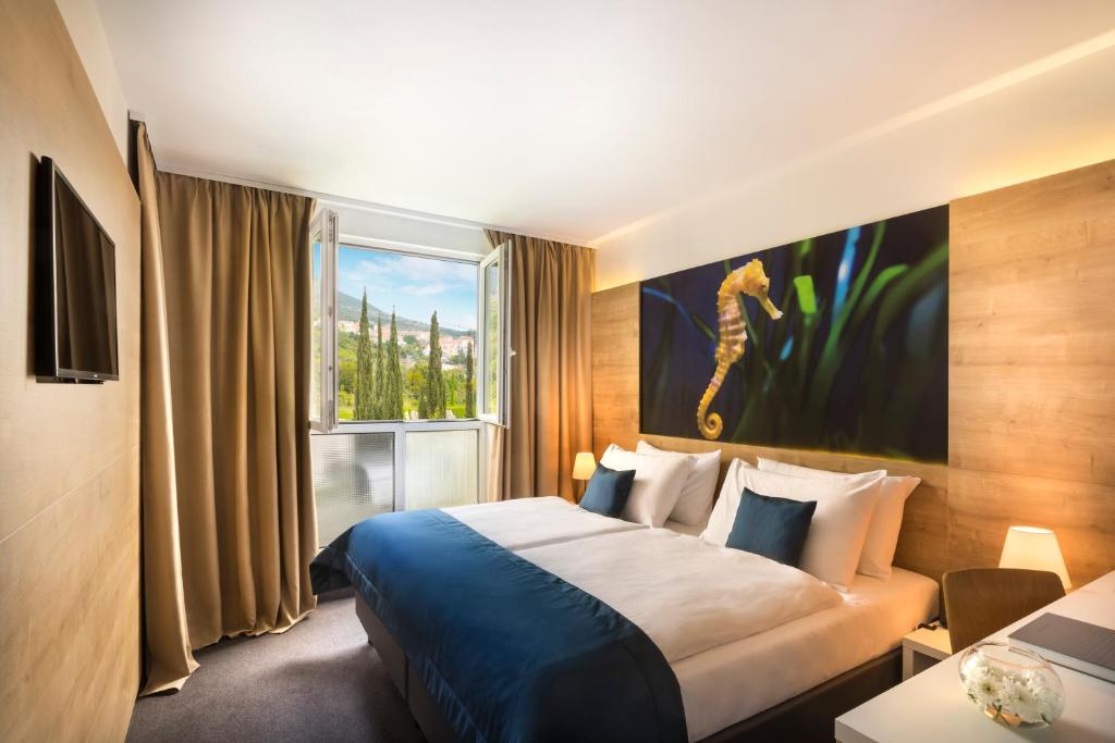 Postel nebo postele na pokoji v ubytování Remisens Hotel Epidaurus-All inclusive