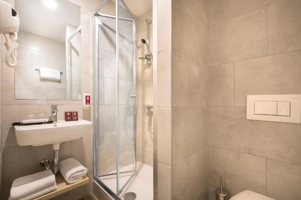 Koupelna v ubytování Remisens Hotel Epidaurus-All inclusive