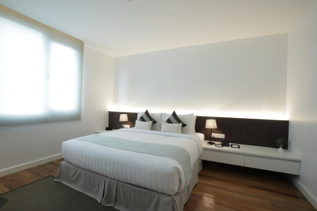 Postel nebo postele na pokoji v ubytování Residence26
