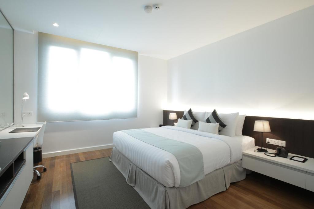 Postel nebo postele na pokoji v ubytování Residence26