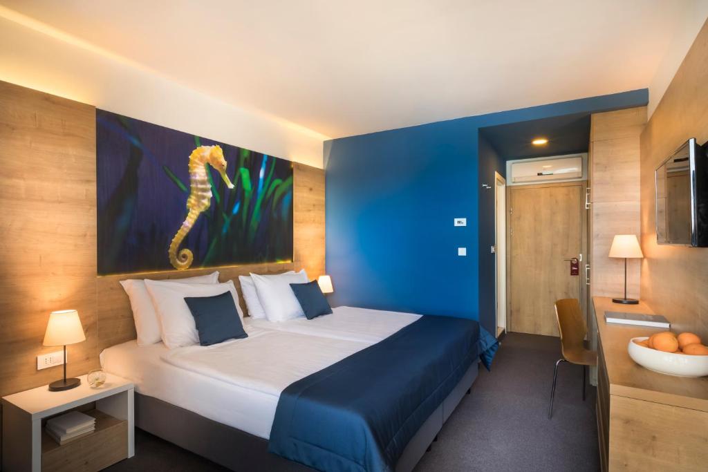 Postel nebo postele na pokoji v ubytování Remisens Hotel Epidaurus-All inclusive