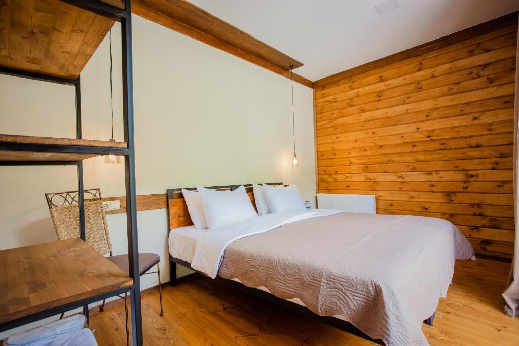 Postel nebo postele na pokoji v ubytování Chalet Mestia