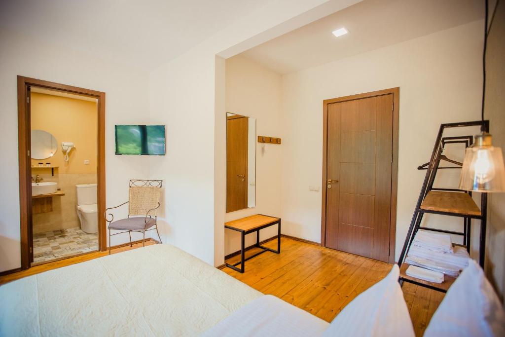 Postel nebo postele na pokoji v ubytování Chalet Mestia