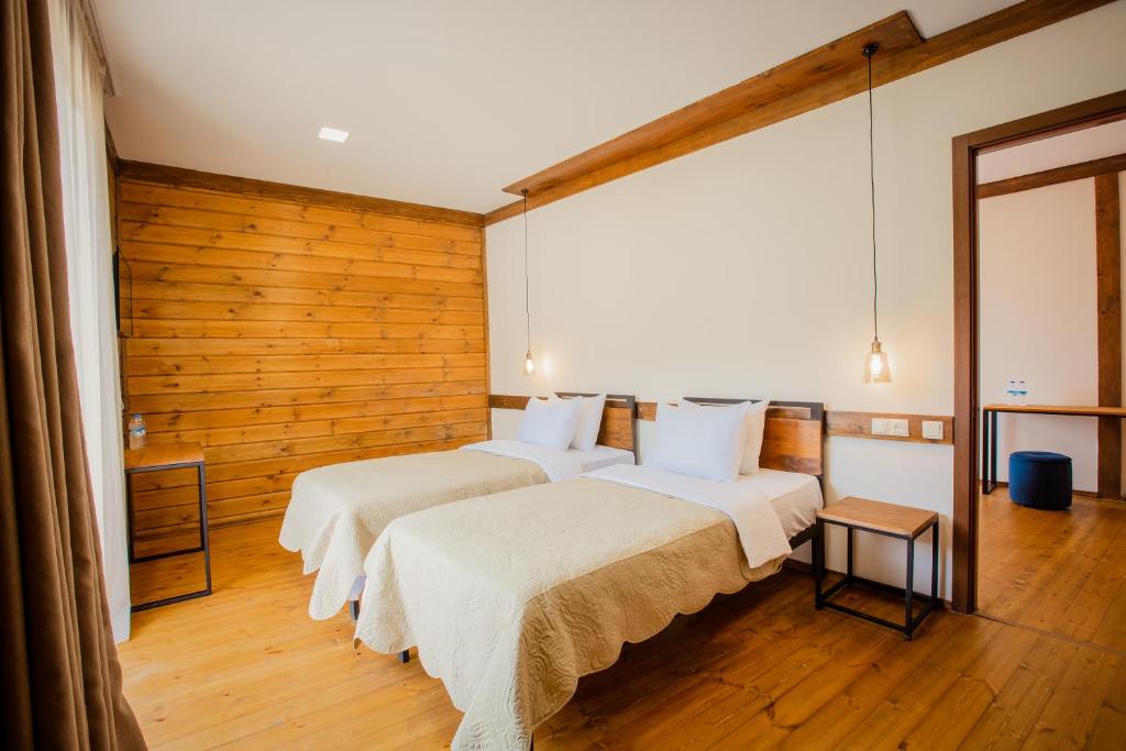 Postel nebo postele na pokoji v ubytování Chalet Mestia