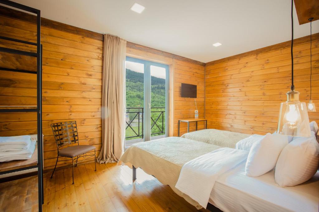 Postel nebo postele na pokoji v ubytování Chalet Mestia