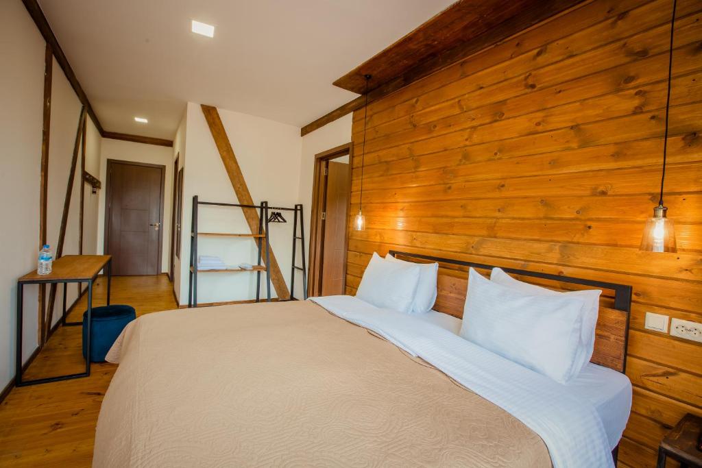 Postel nebo postele na pokoji v ubytování Chalet Mestia
