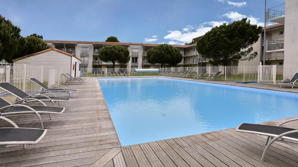 Bazén v ubytovaní Vacancéole - Le Domaine du Château - La Rochelle / Île de Ré alebo v jeho blízkosti
