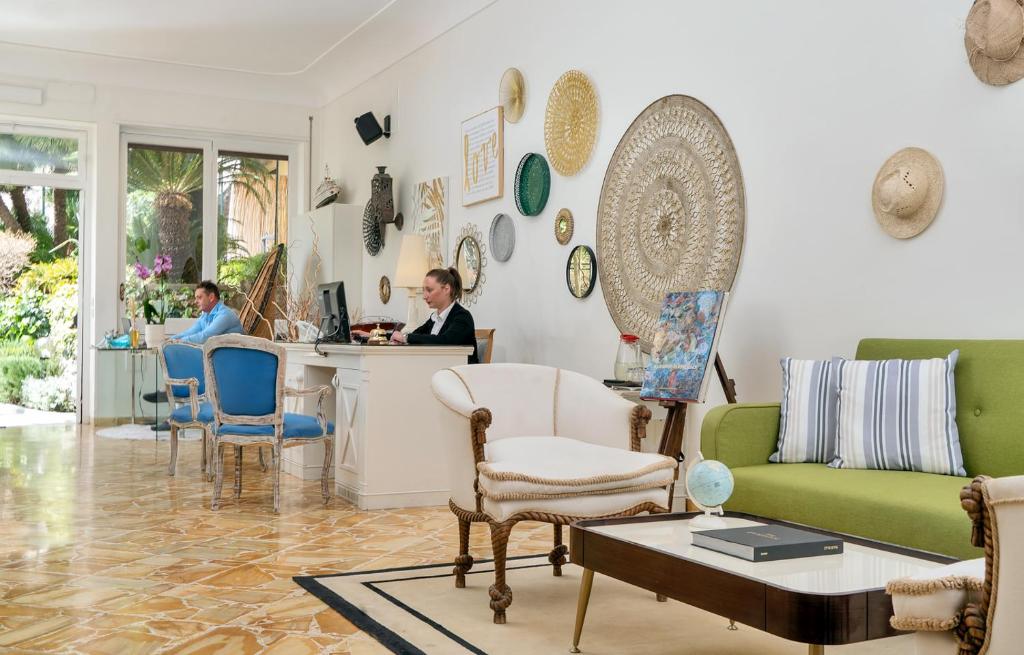 a living room filled with lots of furniture at Villa Helios in Capri