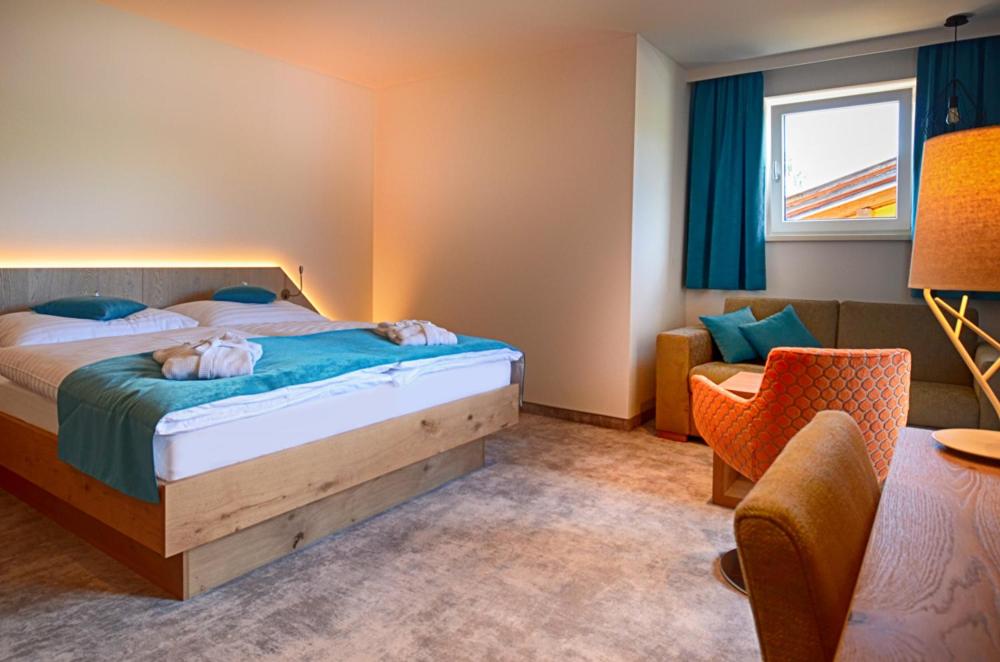 Postel nebo postele na pokoji v ubytování Aktiv- und Wellnesshotel Gutjahr