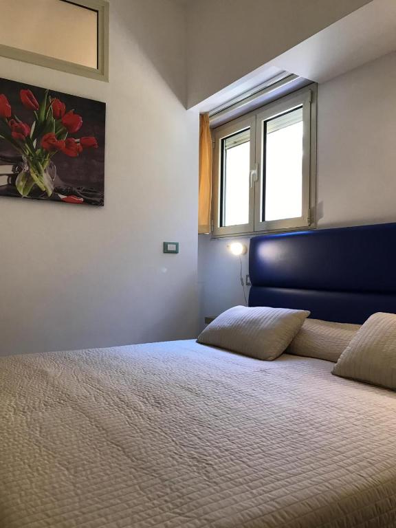 Postel nebo postele na pokoji v ubytování IG-Tysandros Hotel Apartments