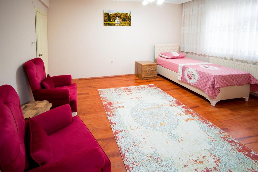Postel nebo postele na pokoji v ubytování Cayeli Kent Apart