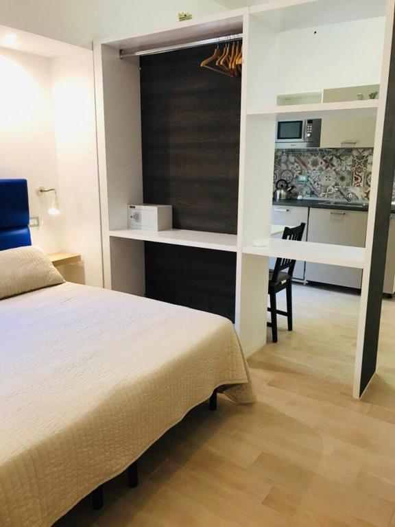 Postel nebo postele na pokoji v ubytování IG-Tysandros Hotel Apartments