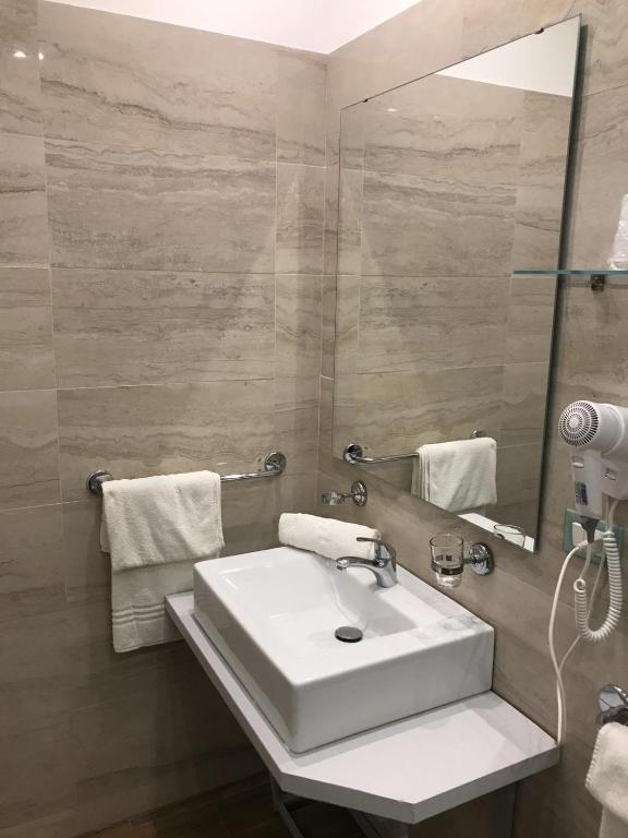 Koupelna v ubytování IG-Tysandros Hotel Apartments