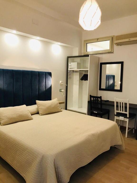 Postel nebo postele na pokoji v ubytování IG-Tysandros Hotel Apartments