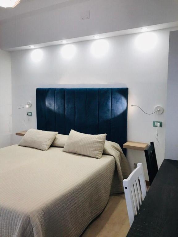 Postel nebo postele na pokoji v ubytování IG-Tysandros Hotel Apartments