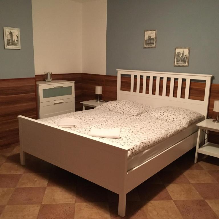 Postel nebo postele na pokoji v ubytování Penzion U Horských