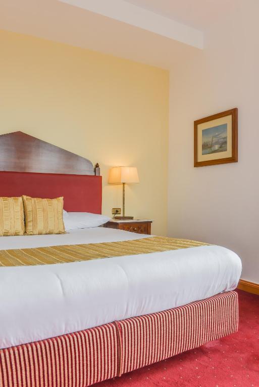 Llit o llits en una habitació de Hotel Flamenco Cairo