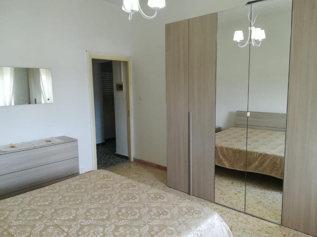 Postel nebo postele na pokoji v ubytování CASA CHINAPPI