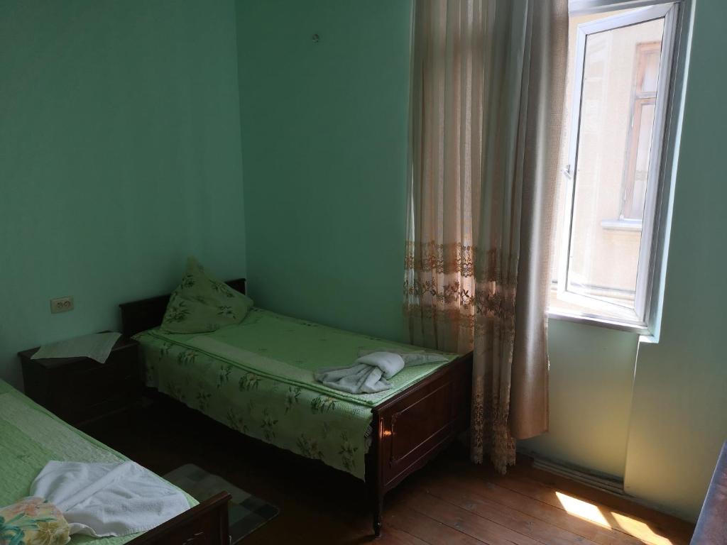 Postel nebo postele na pokoji v ubytování Shorena's House