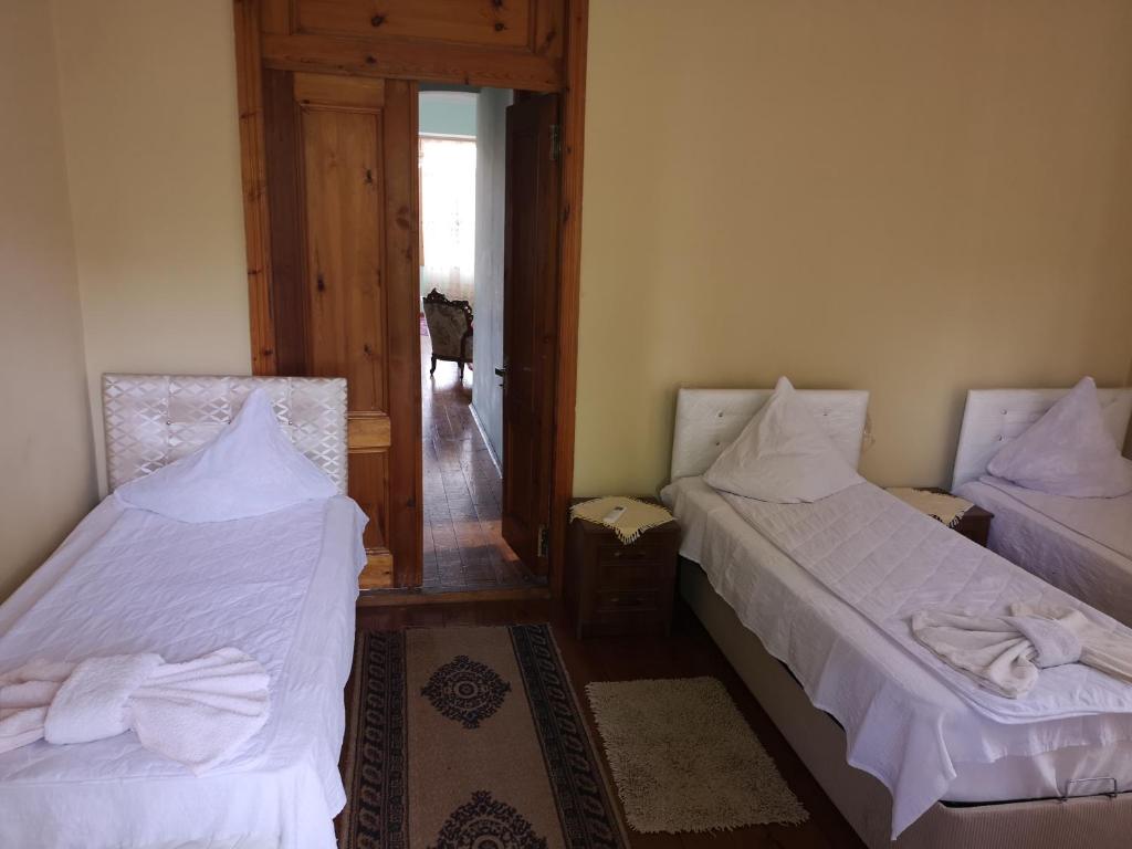 Postel nebo postele na pokoji v ubytování Shorena's House