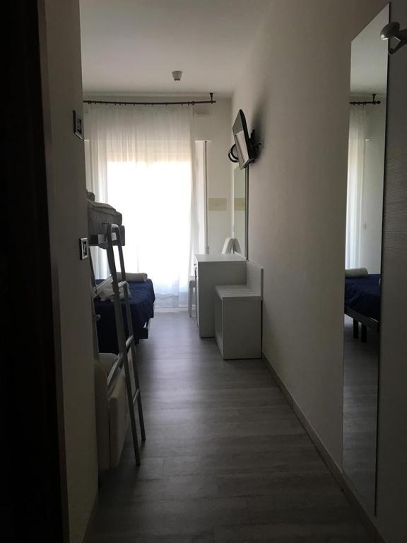 TV a/nebo společenská místnost v ubytování Hotel Saint Tropez