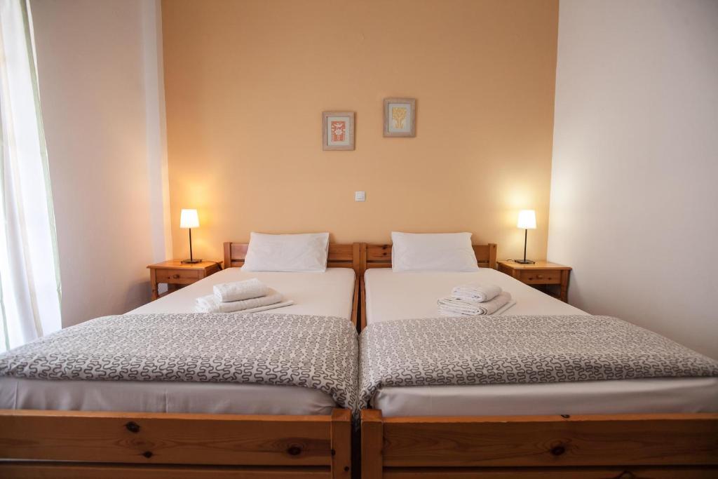 Postel nebo postele na pokoji v ubytování Sofia Apartments - Kantia