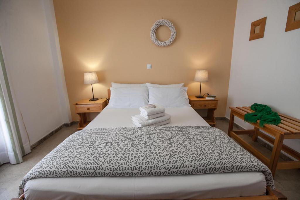 Postel nebo postele na pokoji v ubytování Sofia Apartments - Kantia