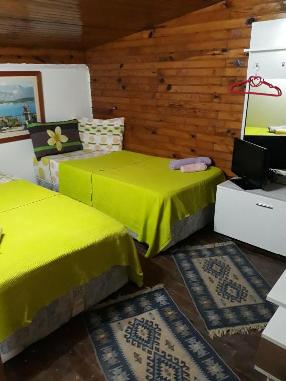 Postel nebo postele na pokoji v ubytování Side Tuana Garden Home