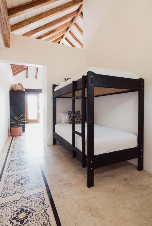 Postel nebo postele na pokoji v ubytování Villas Los Olivos