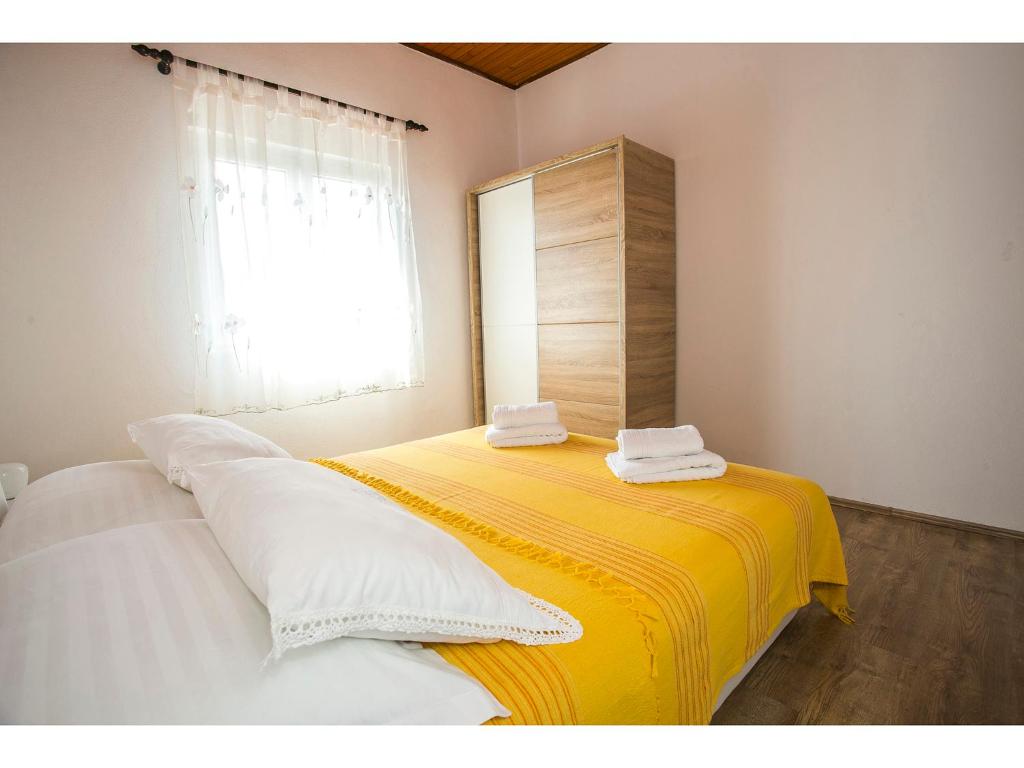 Postel nebo postele na pokoji v ubytování Apartment Goga's Retreat in Marina
