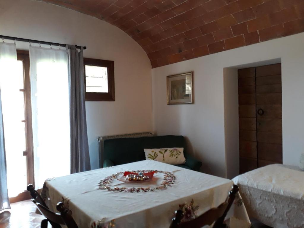 Postel nebo postele na pokoji v ubytování Podere Alberello