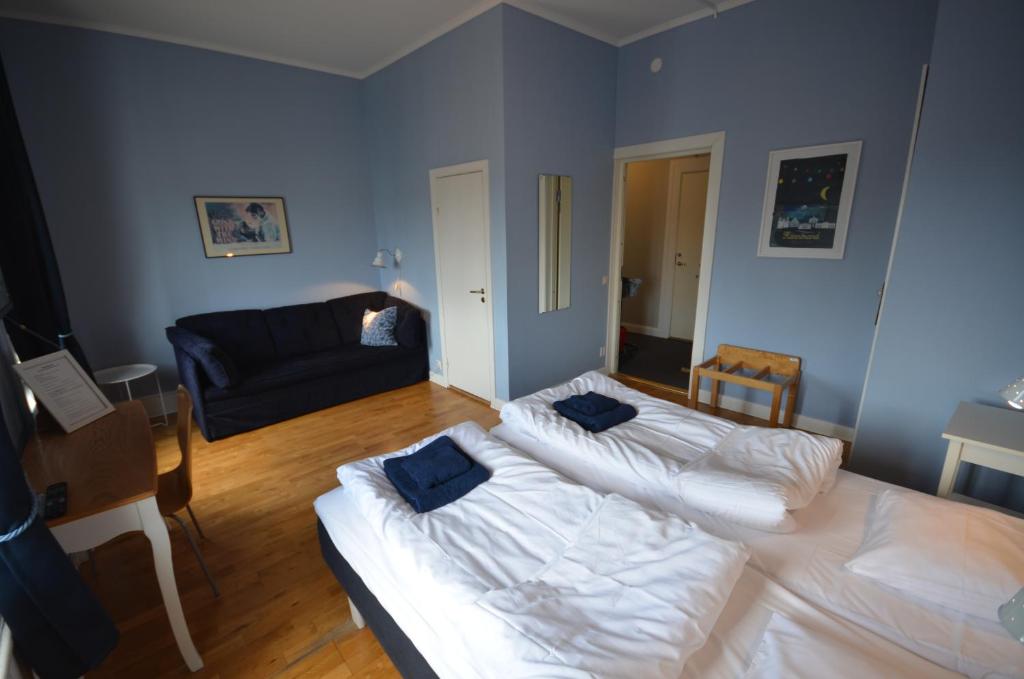 Postel nebo postele na pokoji v ubytování Hotell Royal