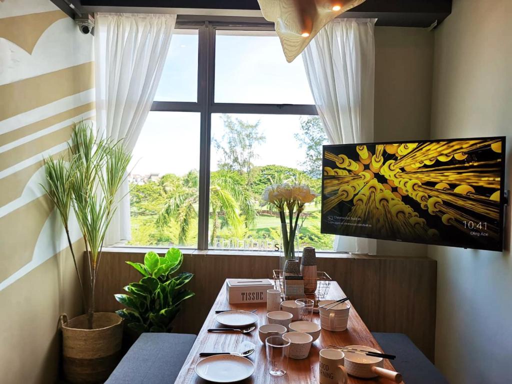 TV a/nebo společenská místnost v ubytování Oikos Poshtel
