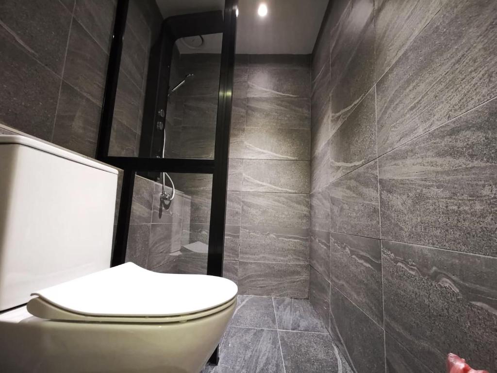 Koupelna v ubytování Oikos Poshtel
