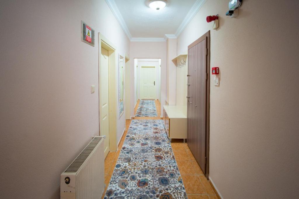 Postel nebo postele na pokoji v ubytování Cayeli Kent Apart
