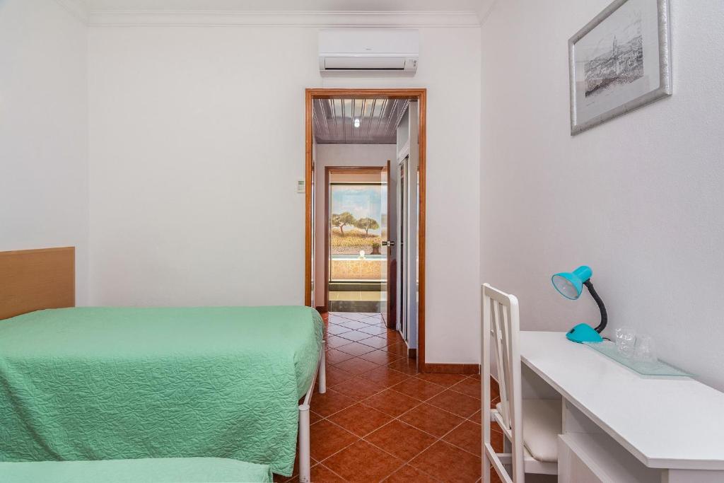 Cama ou camas em um quarto em Graca Hotel