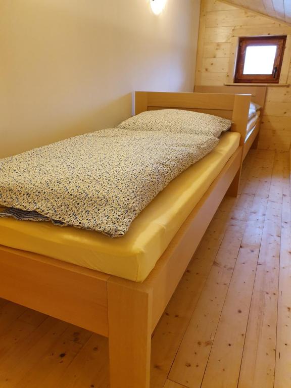 Postel nebo postele na pokoji v ubytování Sport-hotel Šibeniční vrch