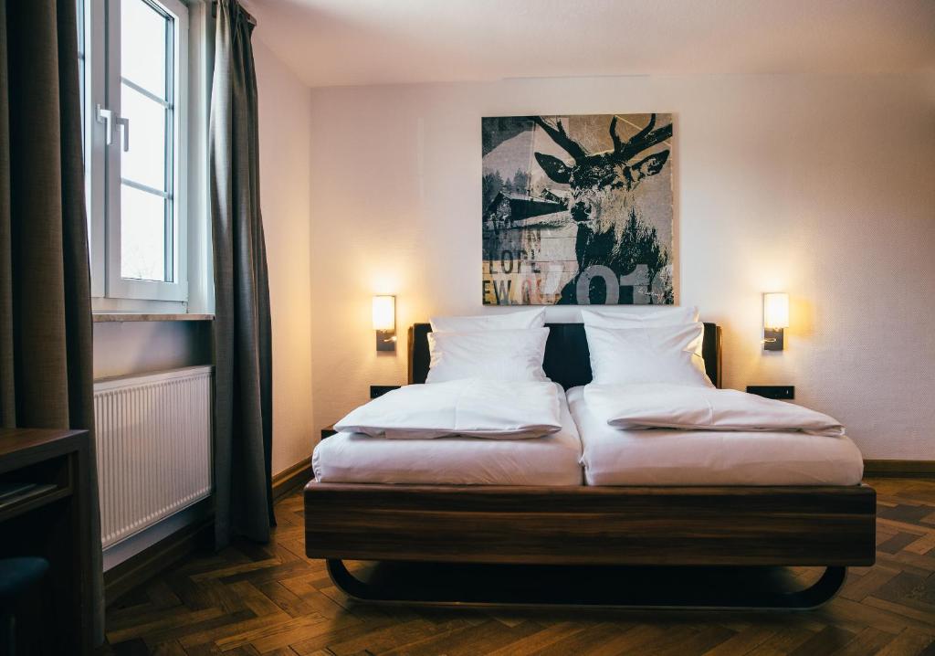 Postel nebo postele na pokoji v ubytování Boutique-Hotel Bayerischer Hof
