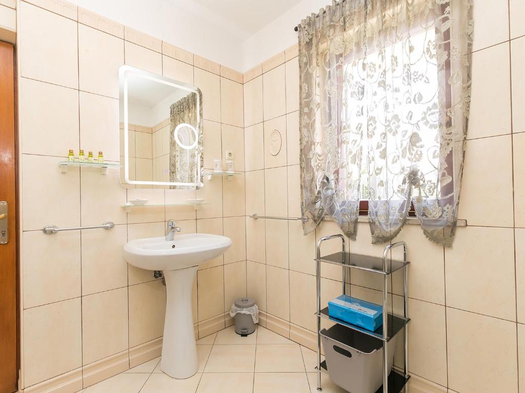 Koupelna v ubytování Apartments Nada