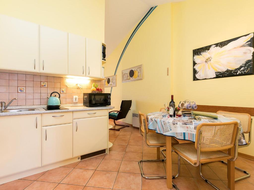 Kuchyň nebo kuchyňský kout v ubytování Apartments Nada
