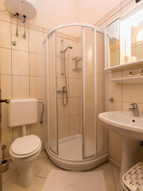 Koupelna v ubytování Apartments Nada