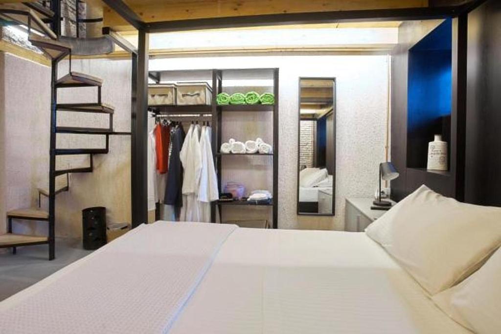 Posteľ alebo postele v izbe v ubytovaní Athenian Residences