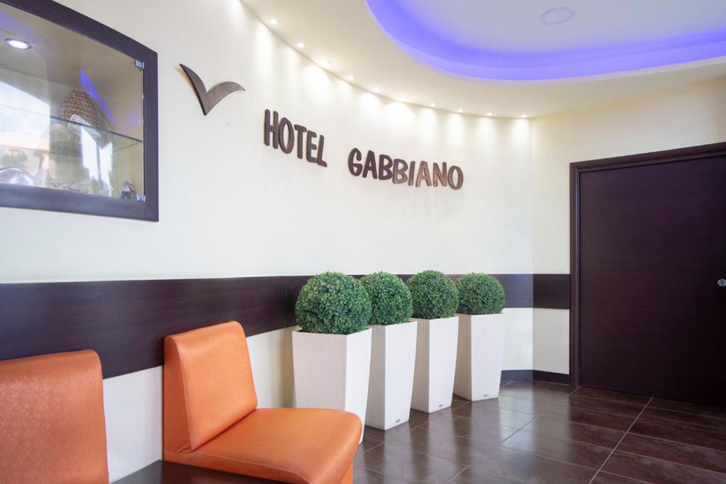 A television and/or entertainment centre at Hotel Gabbiano