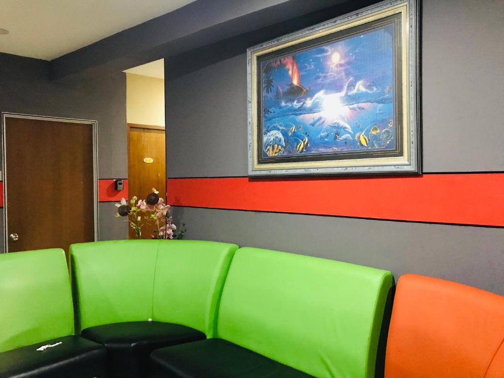 Posezení v ubytování Home Inn Hotel